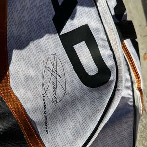 Head Black, White, and Orange Tennis Bag